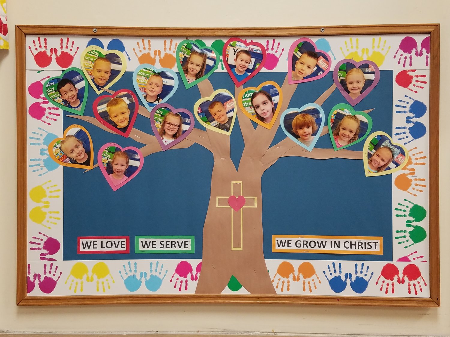 This banner in Holy Family School illustrates service.