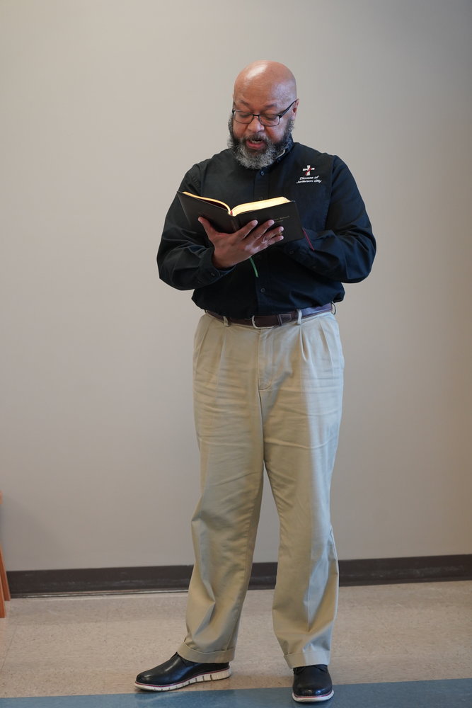 Deacon William Seibert reads a passage from Matthew, Chapter 5, known as the Beatitudes.
