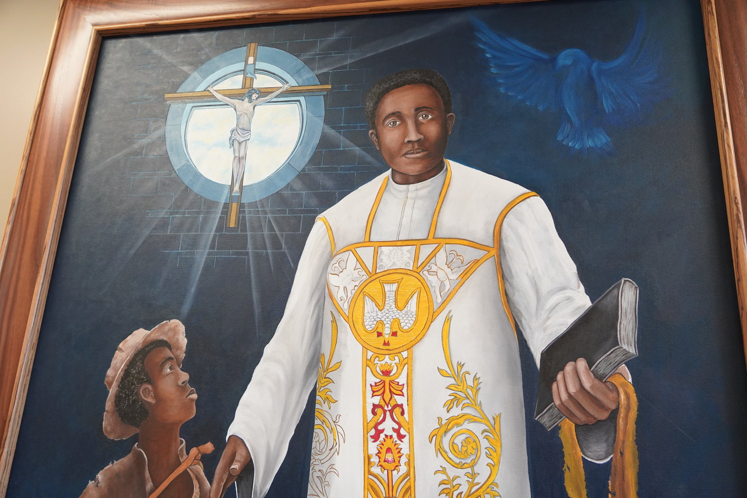 This new artwork, “The Light that Guides the Faithful" by Lonnie Carlos Tapia, was commissioned in honor of the 10th anniversary of Fr. Tolton Regional Catholic High School in Columbia.