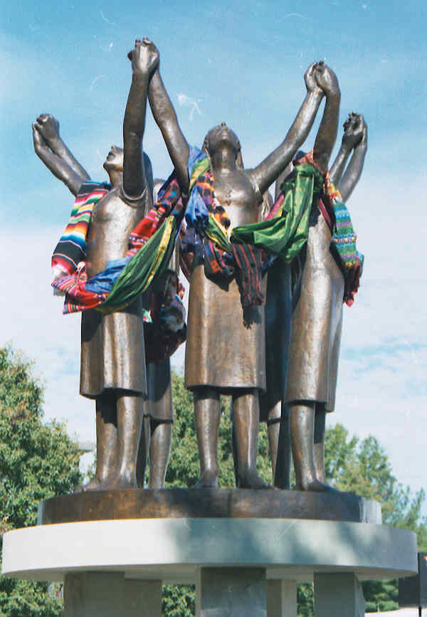 This sculpture, titled “Martyrs of Charity,” honors the four sisters of the Adorers of the Blood of Christ who were killed while ministering in Liberia 30 years ago during that country’s civil war. Sister Kate Reid ASC adorned the figures with colorful shawls woven by women all over the world, to commemorate the 10th anniversary in 2002.